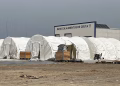 España defiende las carpas en el puerto de Ceuta: “No se puede criticar que los migrantes estén en playas y rechazar que se abran espacios desde el consenso”